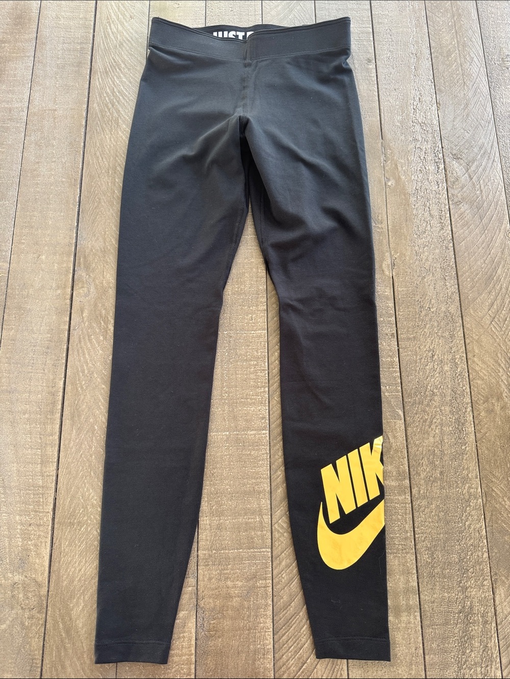 Nike Black Leggings with Gold Logo Print